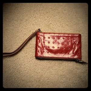 Hobo Juno wallet wristlet clutch in Tomato